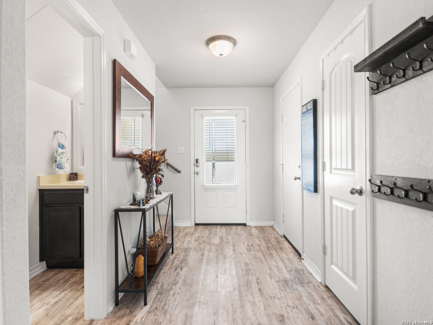 432 Salt Fork Cibolo, TX 78108 - Photo 5 of 19 a view of hallway with wooden floor