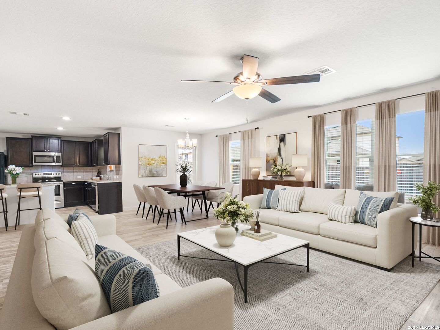 432 Salt Fork Cibolo, TX 78108 - Photo 6 of 19 a living room with furniture kitchen view and a large window