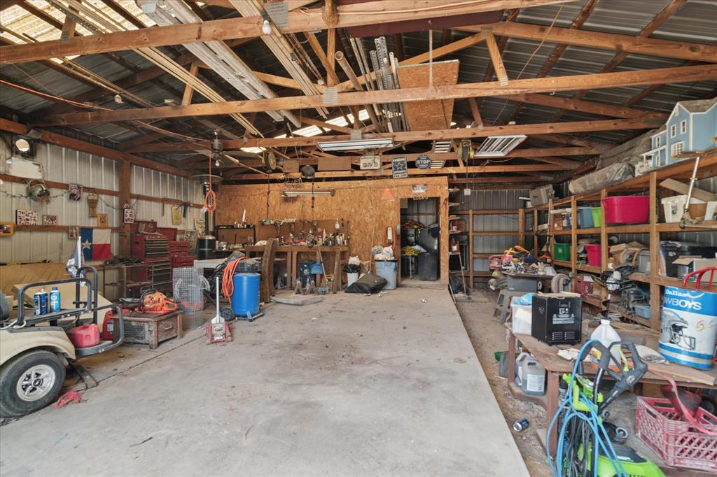 4806 Creekside Road Melissa, TX 75454 - Photo 9 of 10 a view of a storage room with a lot of stuff