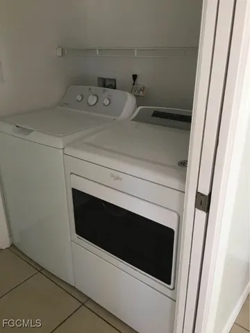 an empty room with a bench