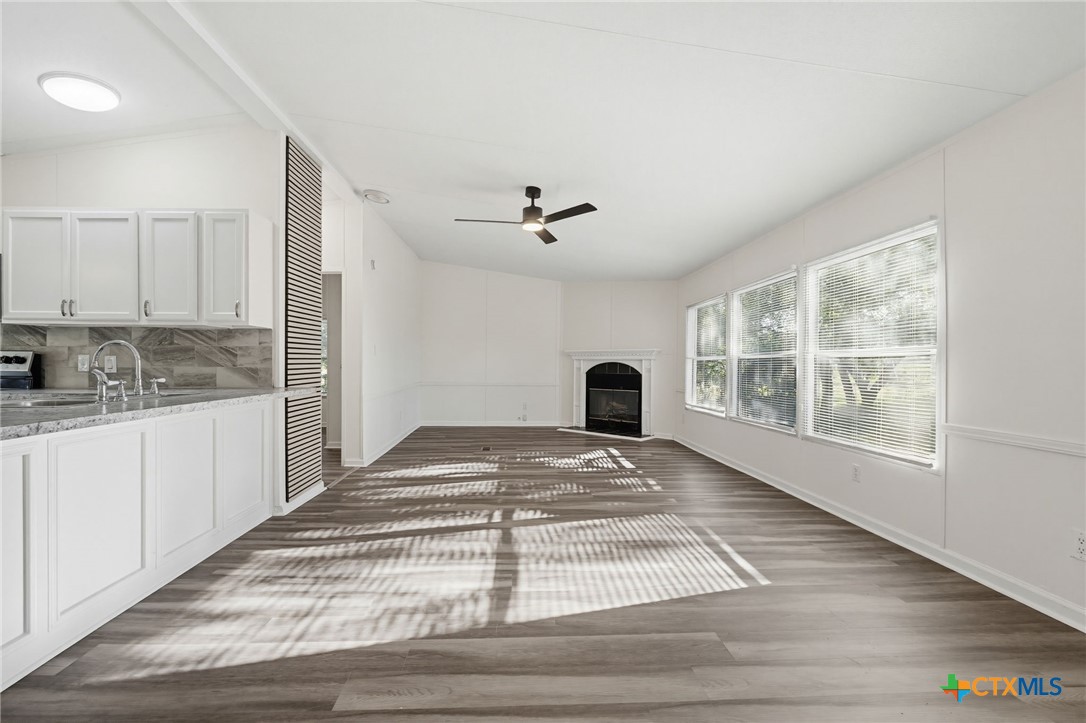2739 Willow Loop Kempner, TX 76539 - Photo 6 of 30 a view of an empty room with a kitchen and window
