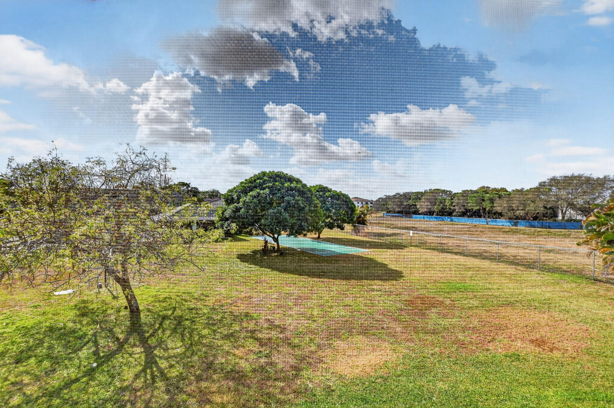9500 Southwest 3rd Street, Unit 213 Boca Raton, FL 33428 - Photo 17 of 42 View from patio and primary bedroom