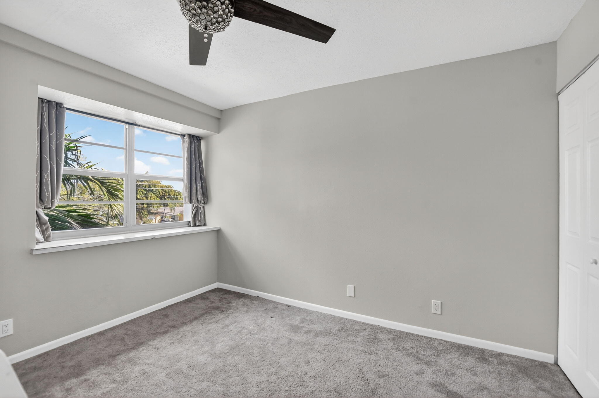 9500 Southwest 3rd Street, Unit 213 Boca Raton, FL 33428 - Photo 29 of 42 Guest bedroom