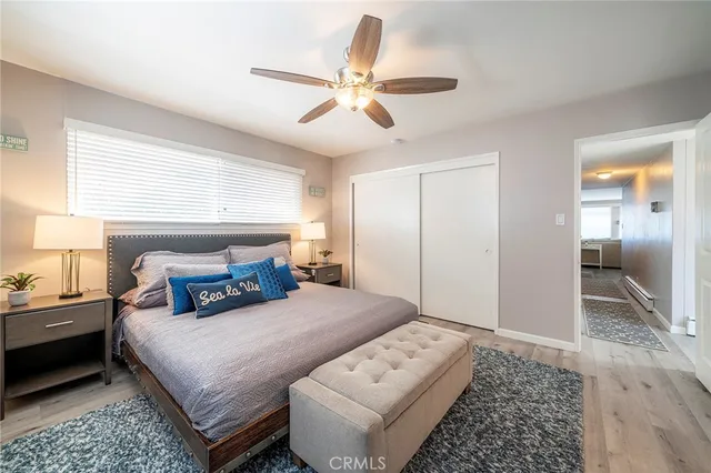 a bedroom with a bed and a walk in closet