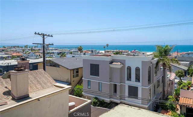 a view of a city with tall buildings