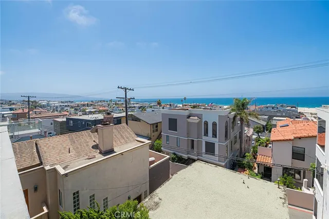 a view of a city with tall buildings