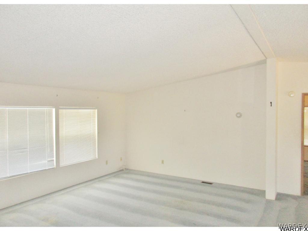 3093 West Rancho Road Golden Valley, AZ 86413 - Photo 8 of 26 Vaulted Ceilings