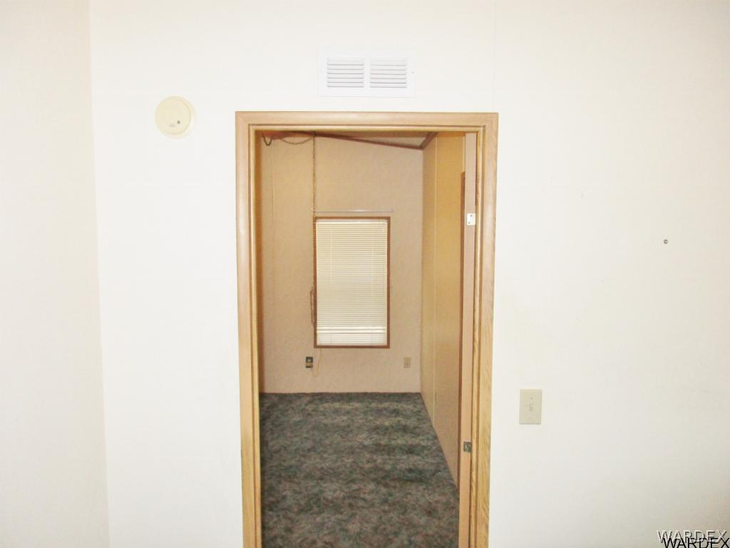 3093 West Rancho Road Golden Valley, AZ 86413 - Photo 9 of 26 To Master Bedroom
