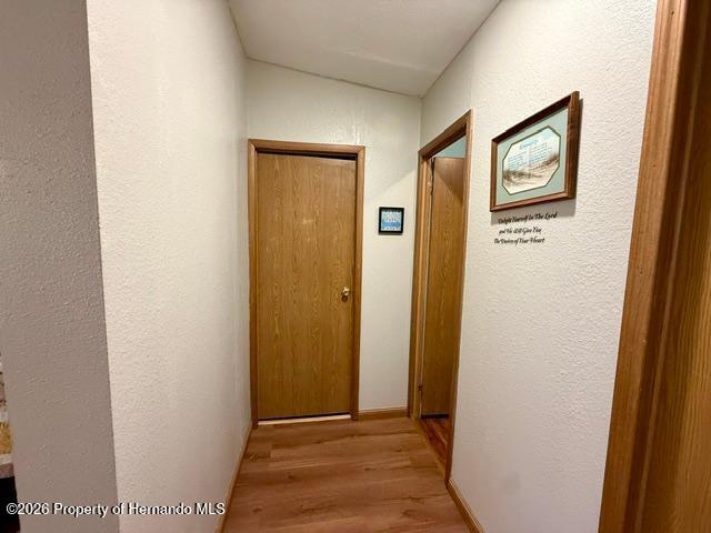 11340 Southwest 28th Way Webster, FL 33597 - Photo 26 of 38 This is the hallway to the second and third bedrooms that are separate from the Main Bedroom.