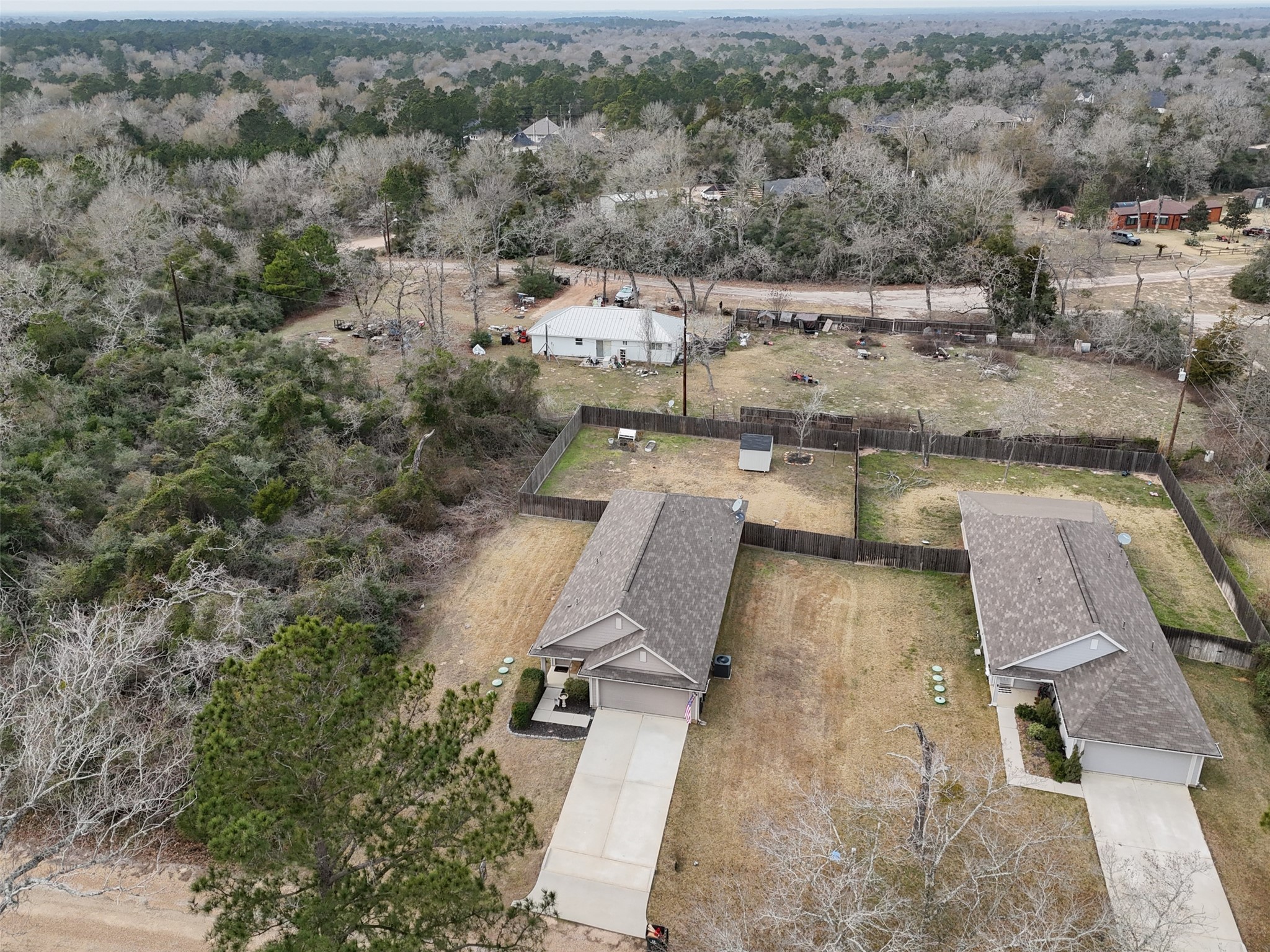 26431 Pin Oak Drive Hempstead, TX 77445 - Photo 26 of 32 Bird’s-eye neighborhood view with the home centered on the property and nearby residences shown for location context.