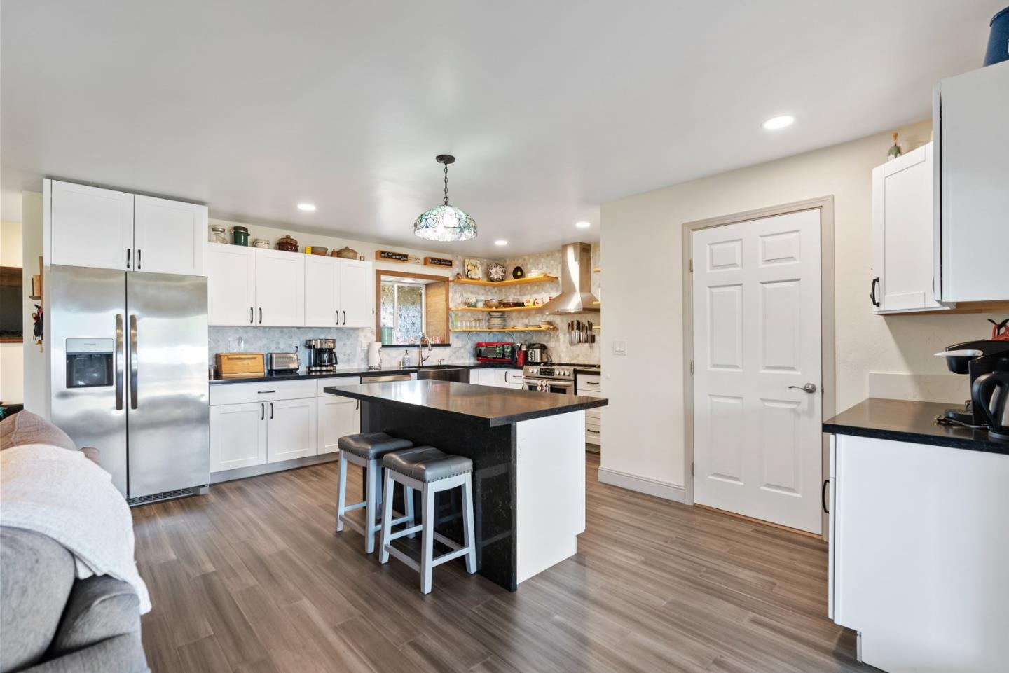 1650 Cambrian Drive Salinas, CA 93906 - Photo 16 of 48 a kitchen with a sink cabinets and wooden floor