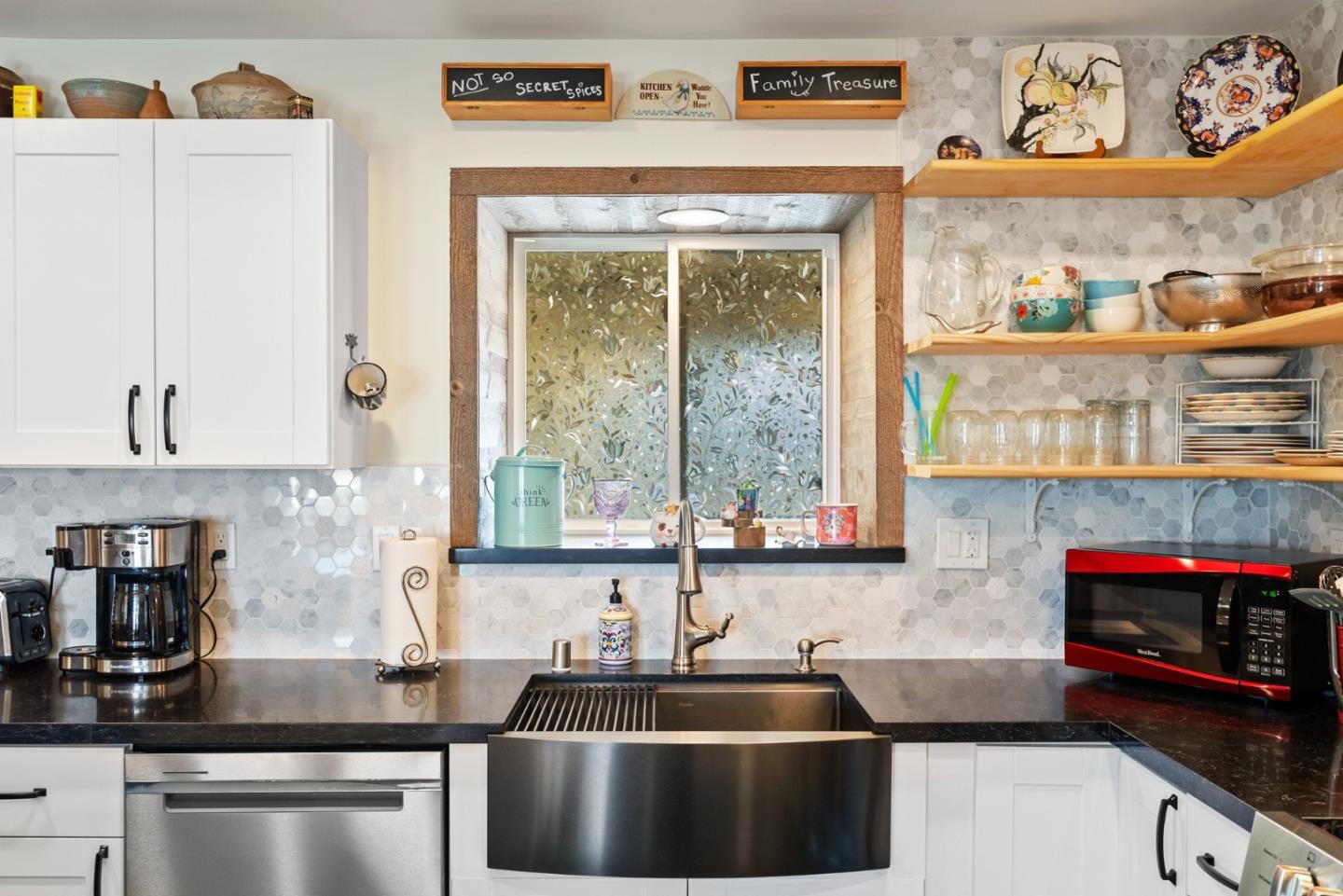 1650 Cambrian Drive Salinas, CA 93906 - Photo 18 of 48 a kitchen with stainless steel appliances granite countertop a sink and a microwave