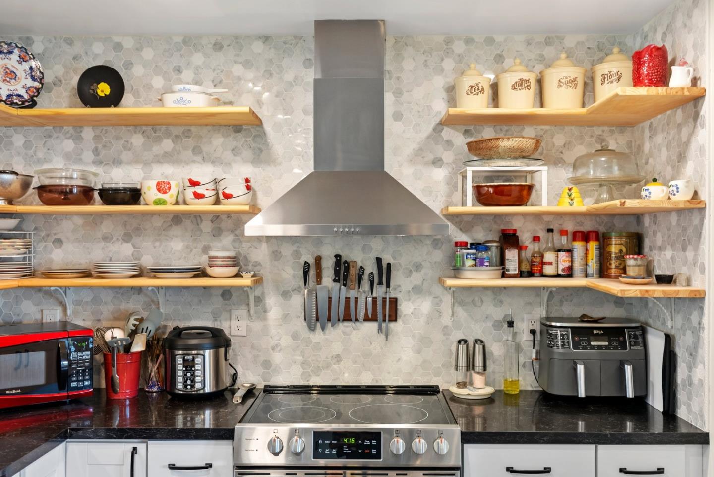 1650 Cambrian Drive Salinas, CA 93906 - Photo 19 of 48 a kitchen with a stove and cabinets