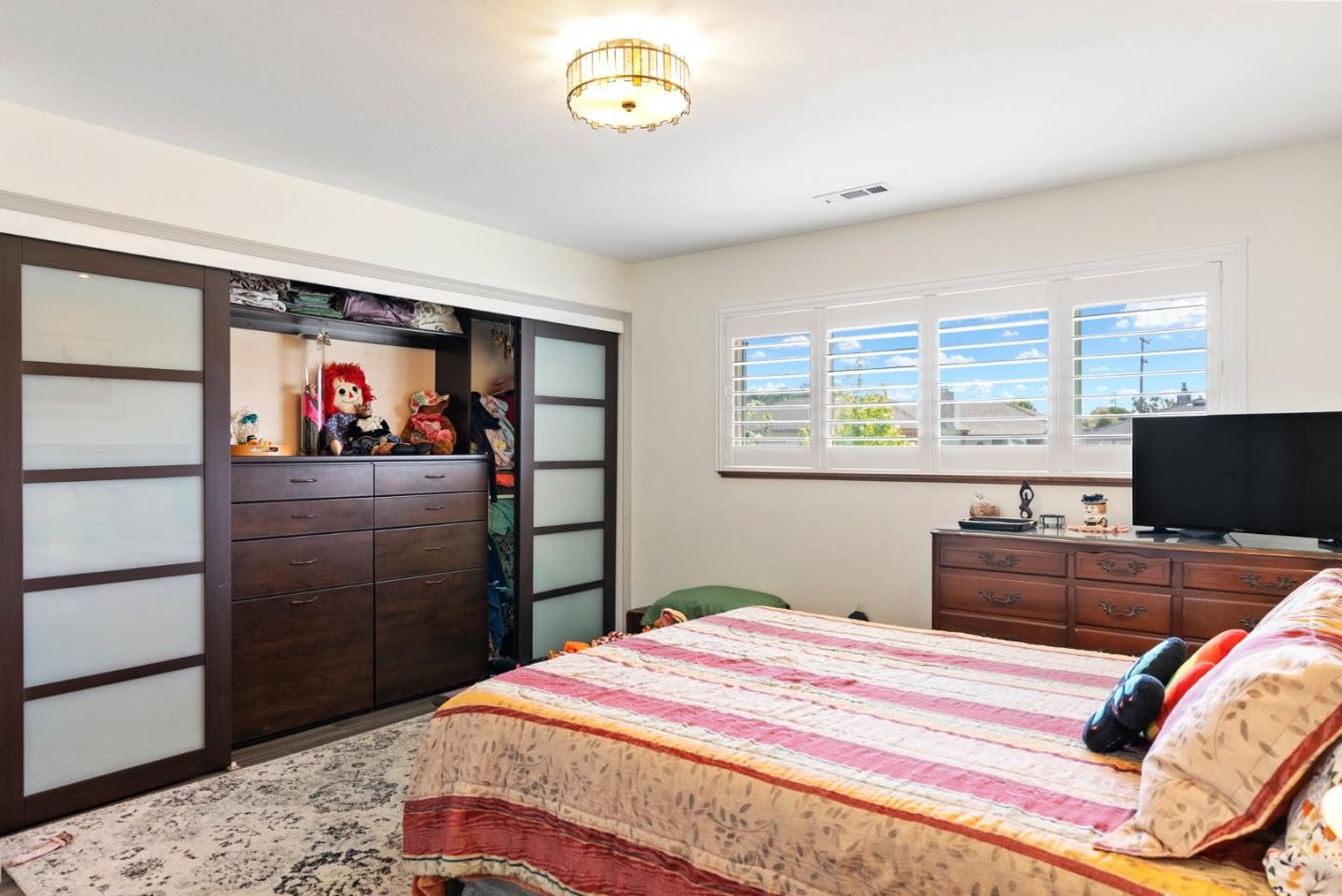 1650 Cambrian Drive Salinas, CA 93906 - Photo 26 of 48 a bedroom with a bed and a dresser