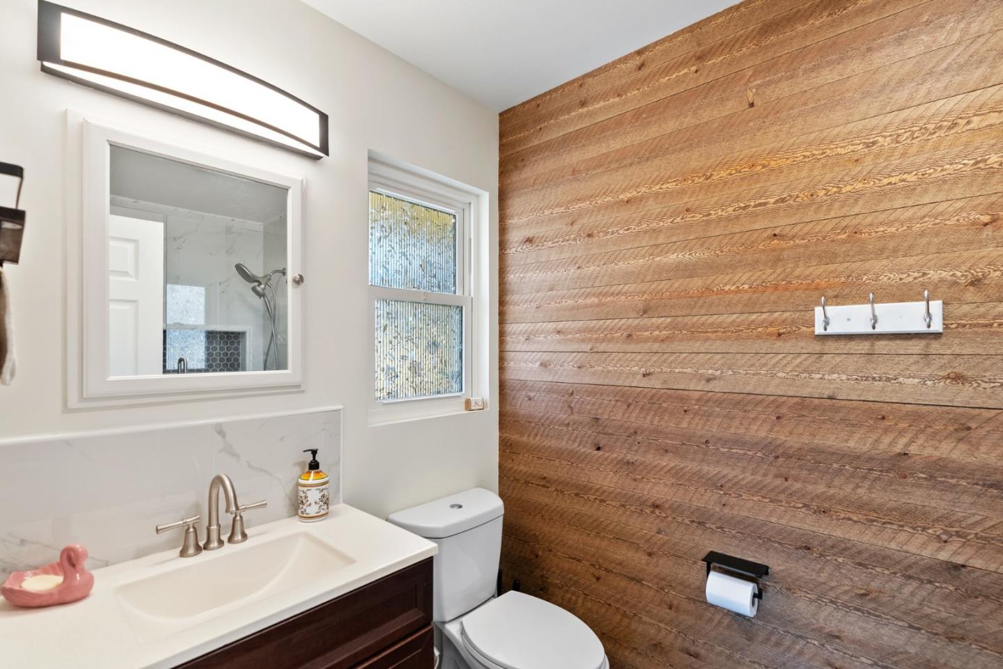 1650 Cambrian Drive Salinas, CA 93906 - Photo 30 of 48 a bathroom with a sink a toilet and mirror