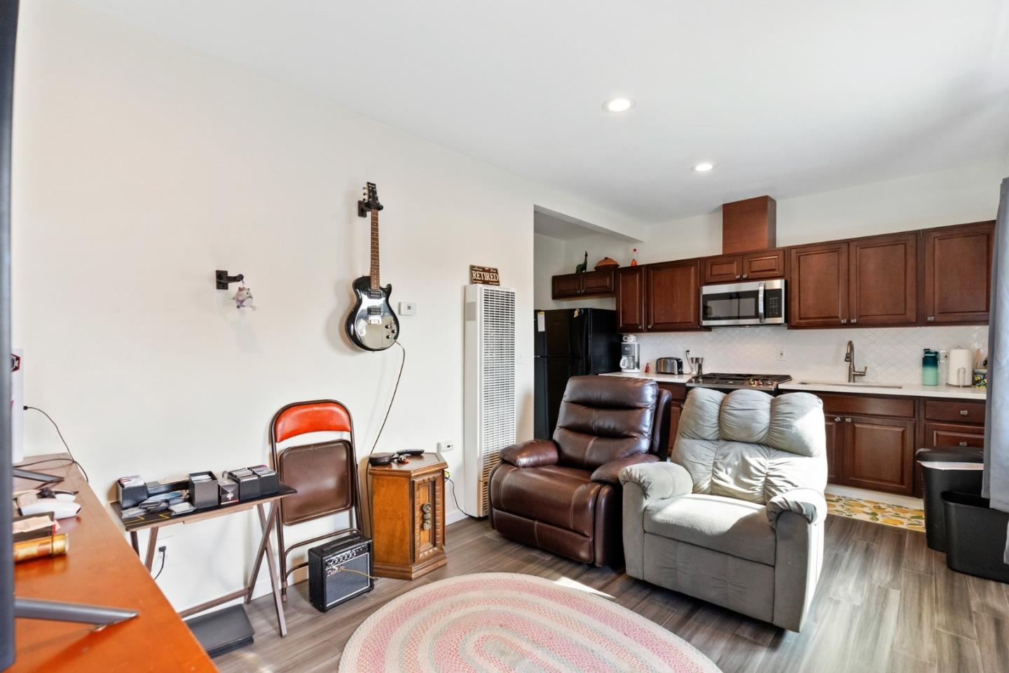 1650 Cambrian Drive Salinas, CA 93906 - Photo 32 of 48 a living room with furniture a flat screen tv and a couch