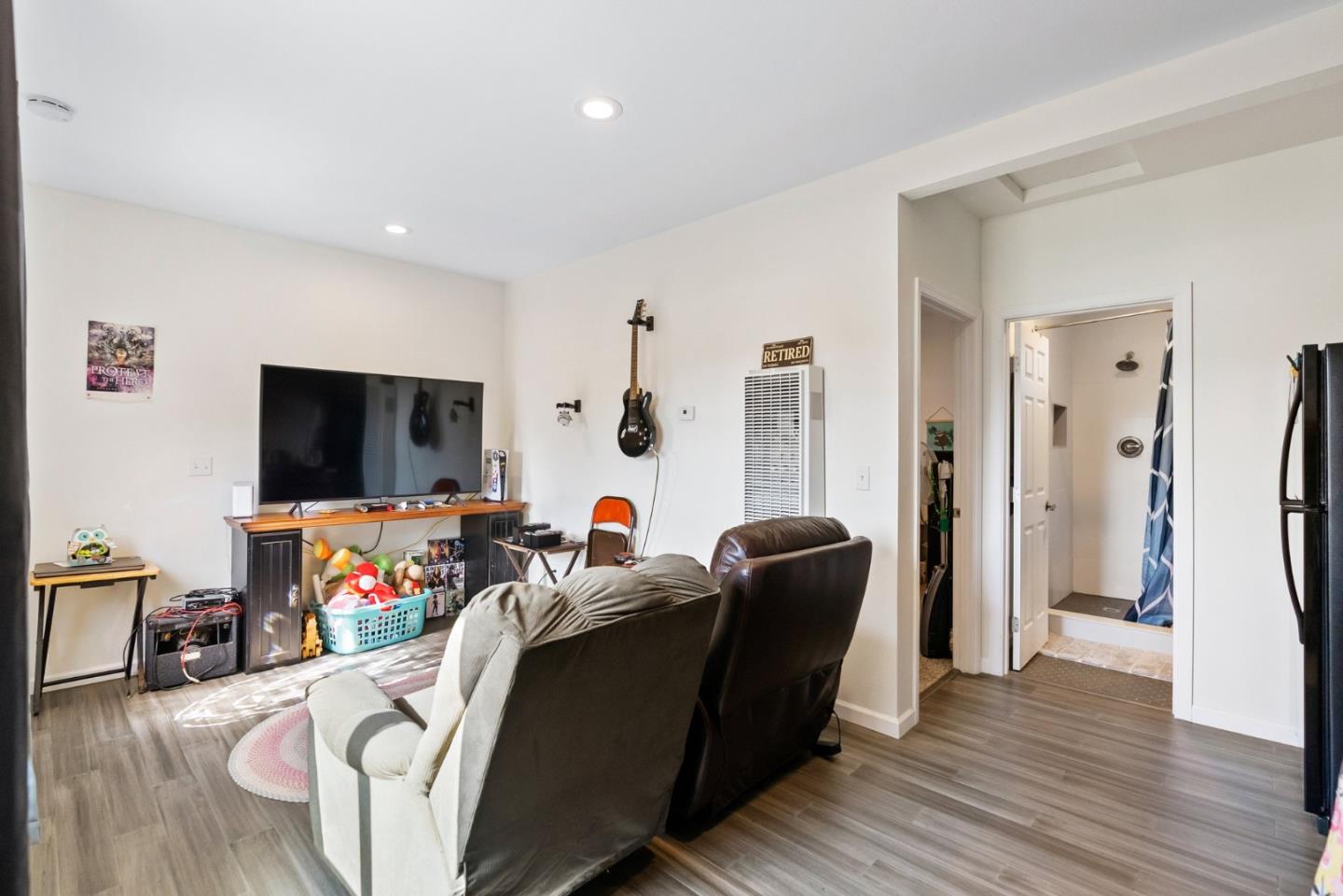 1650 Cambrian Drive Salinas, CA 93906 - Photo 33 of 48 a living room with furniture and a flat screen tv
