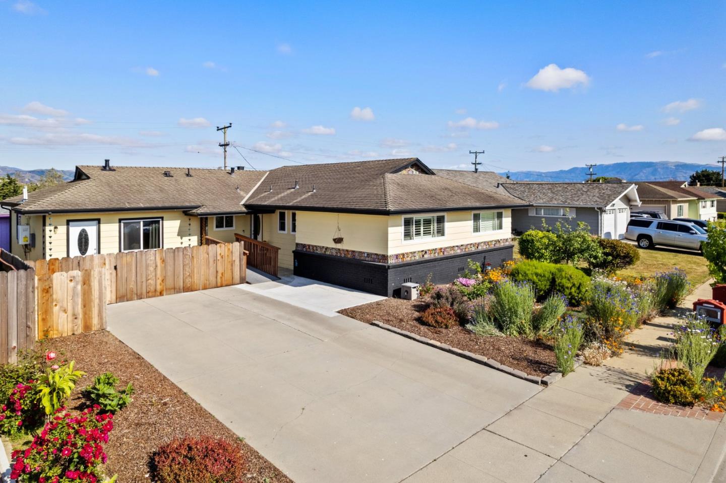 1650 Cambrian Drive Salinas, CA 93906 - Photo 8 of 48 a front view of a house with a yard and fountain