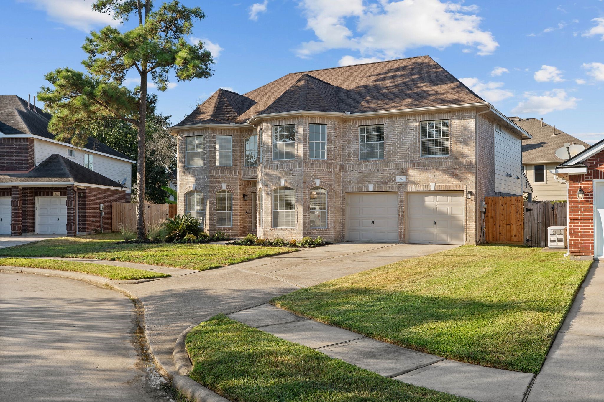 810 Flanners Court Spring, TX 77373 - Photo 4 of 46 a front view of a house with a garden