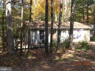 255 Windjammer Road Ocean Pines, MD 21811 - Photo 1 of 4 a view of a house with a yard