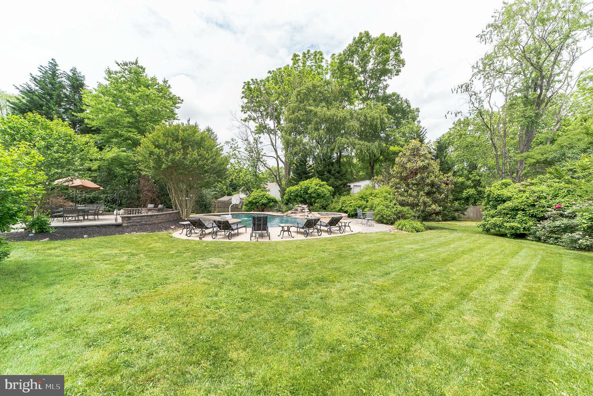785 Gulph Road Wayne, PA 19087 - Photo 37 of 38 Flat grassy area adjacent tp pool patio