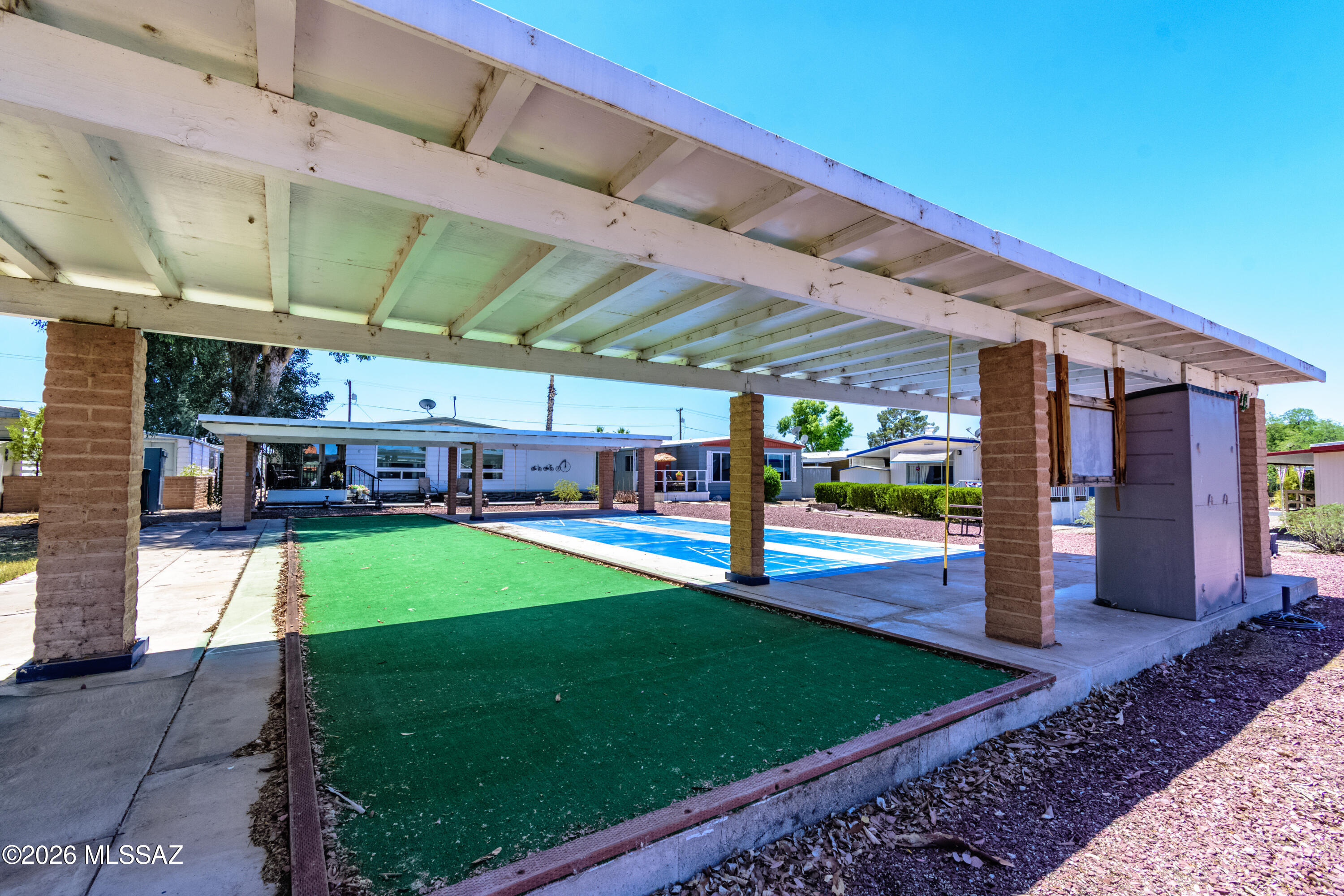 4550 North Flowing Wells Road, Unit 155 Tucson, AZ 85705 - Photo 34 of 40 a view of a backyard with swimming pool