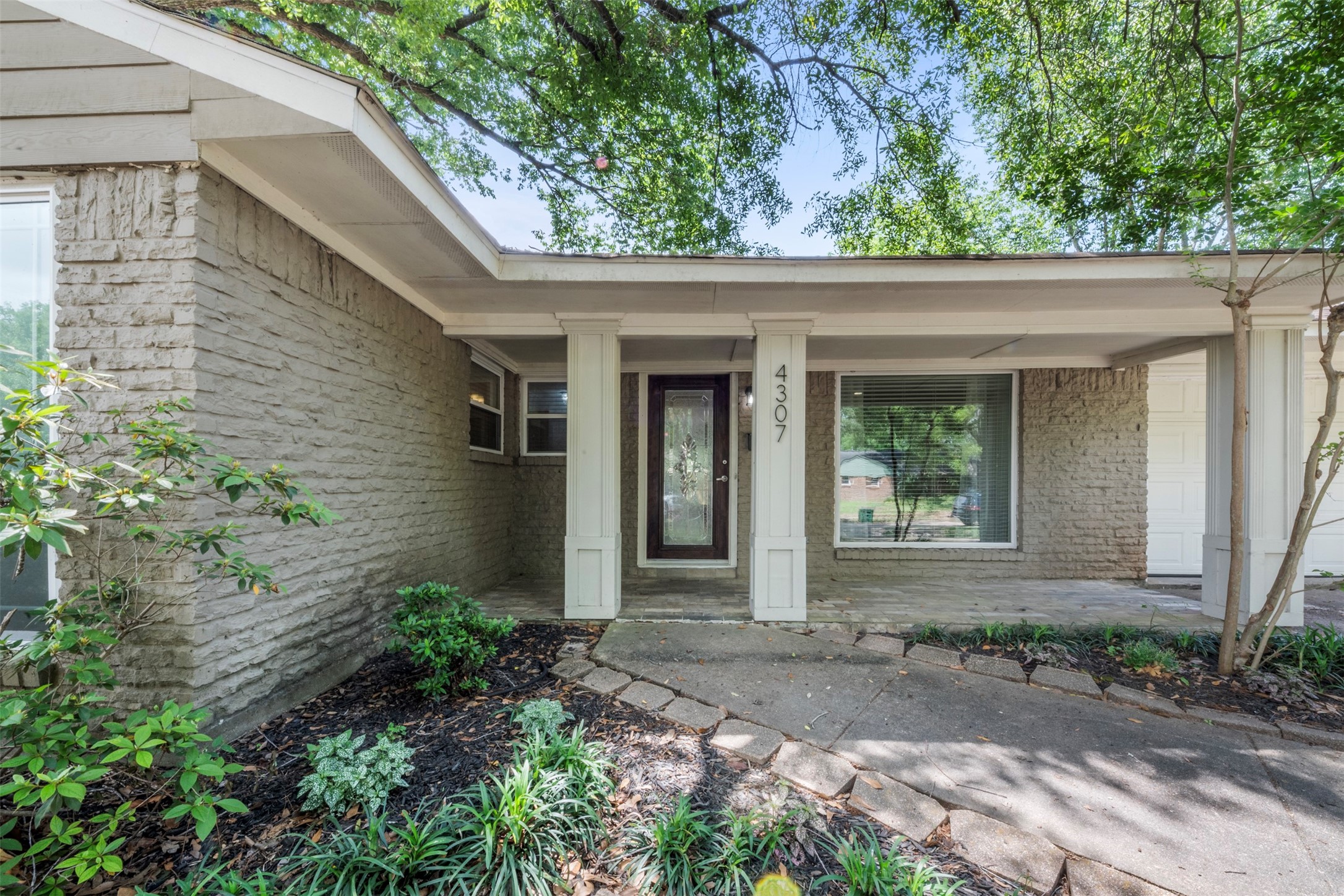 4307 Spellman Road Houston, TX 77035 - Photo 8 of 31 Welcome to 4307 Spellman. Add some rocking chairs or a swing and enjoy your morning coffee under the porch.