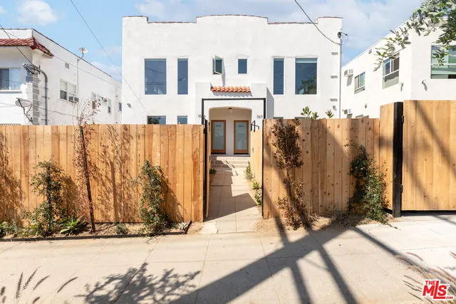 a front view of a building with a outdoor space