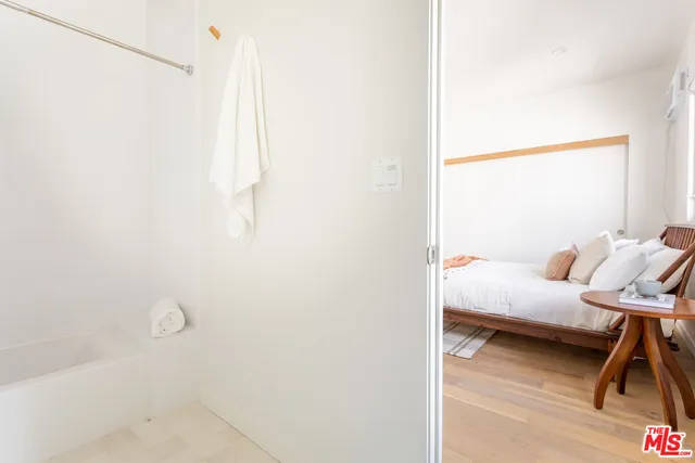 a view of bedroom with furniture