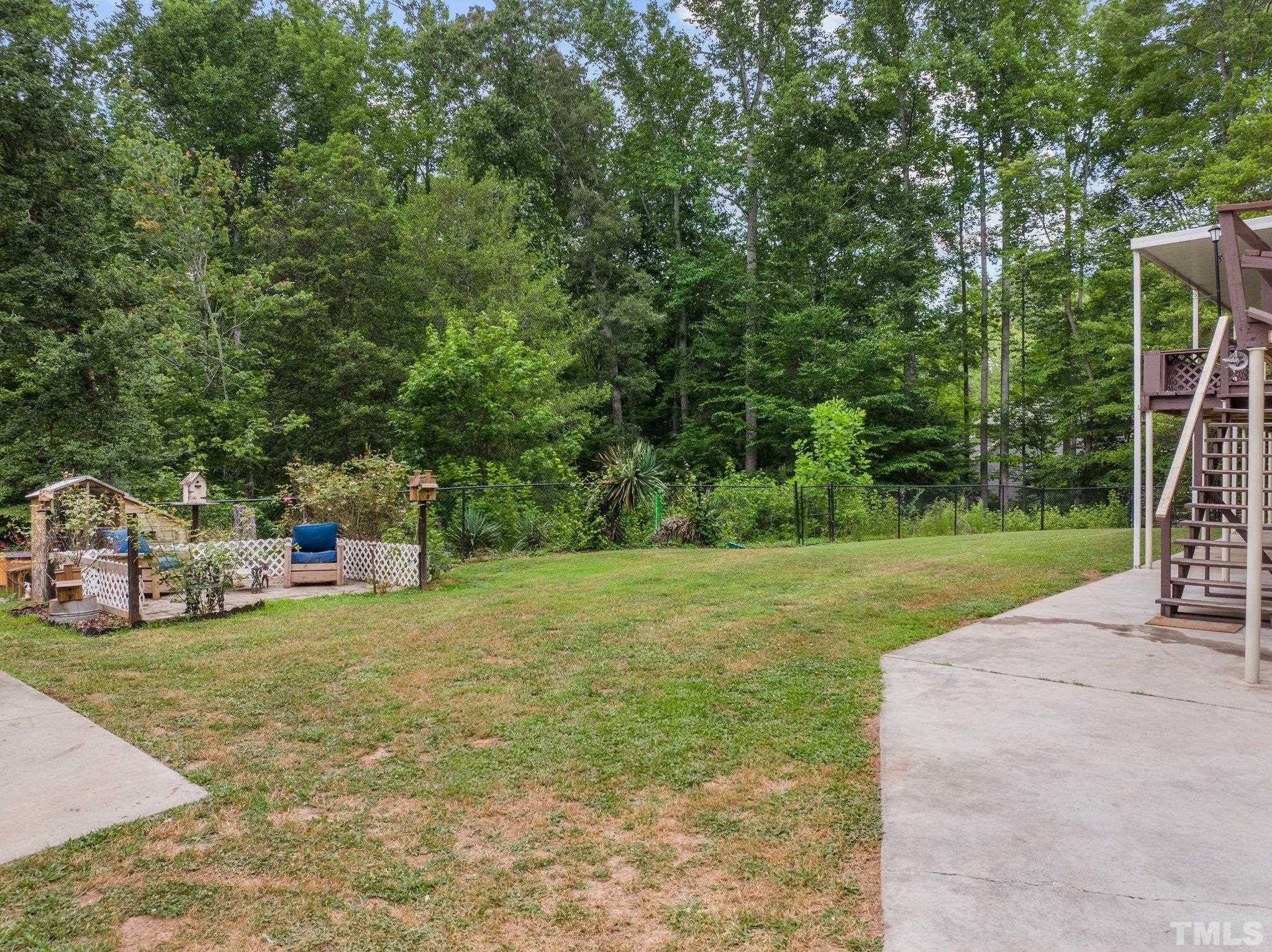 12233 Creedmoor Road Raleigh, NC 27613 - Photo 35 of 57 a view of a park with large trees