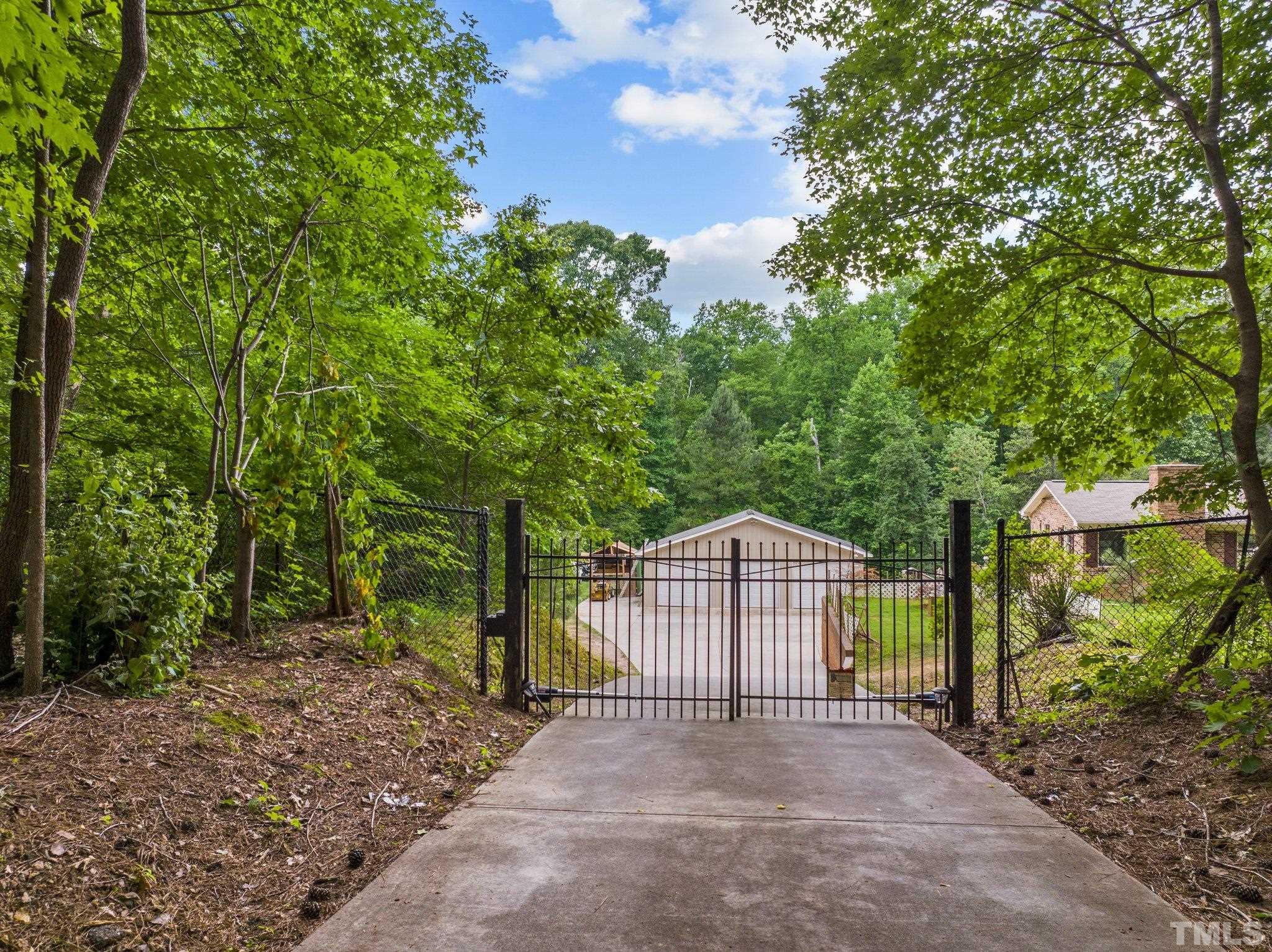 12233 Creedmoor Road Raleigh, NC 27613 - Photo 36 of 57 a view of backyard