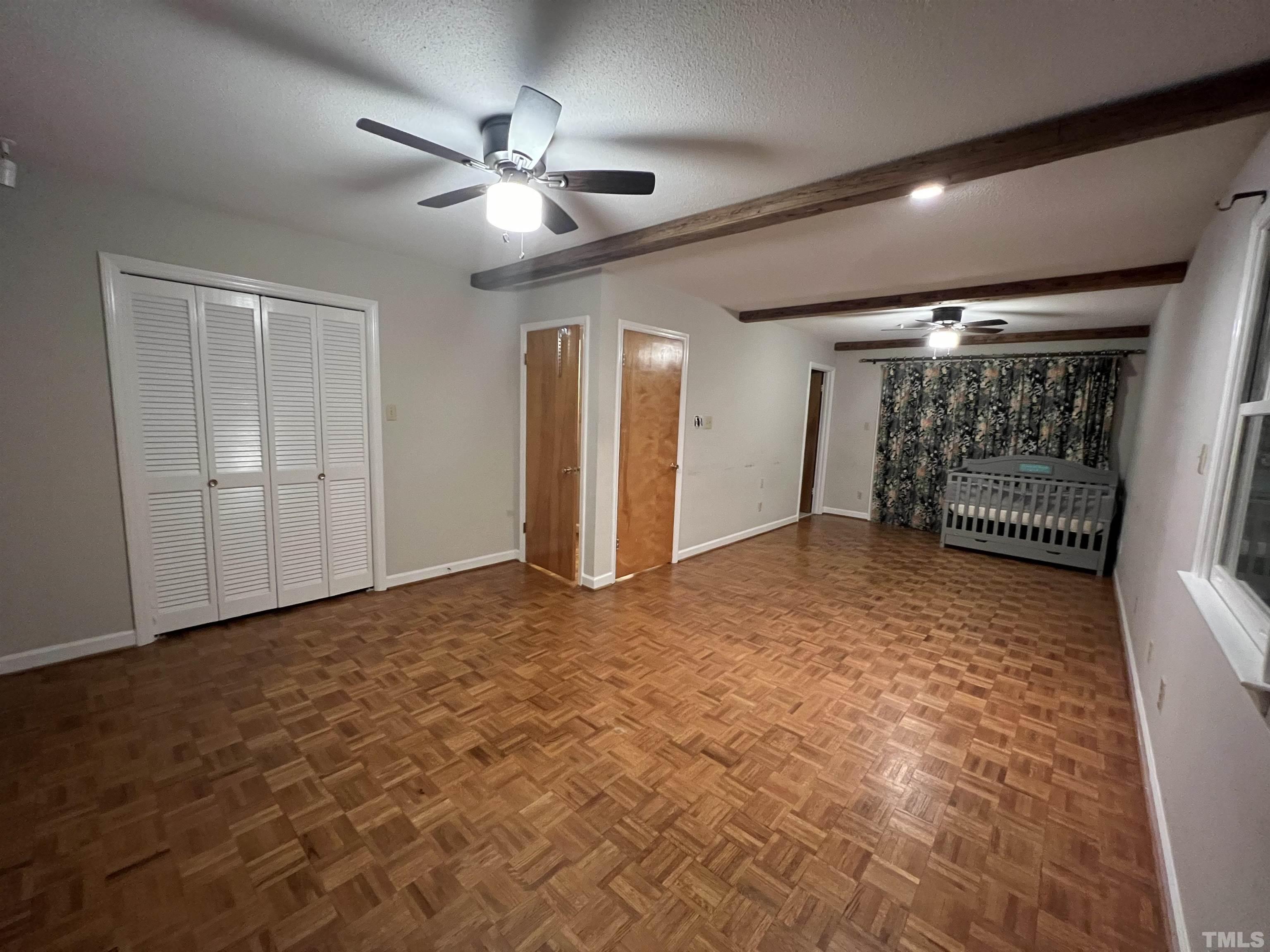 12233 Creedmoor Road Raleigh, NC 27613 - Photo 53 of 57 a view of empty room with wooden floor
