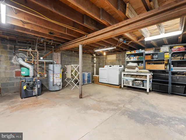 a view of backyard with outdoor seating and green space