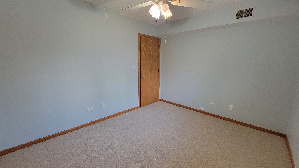 18100 Rita Road, Unit 2D Tinley Park, IL 60477 - Photo 20 of 28 a view of an empty room