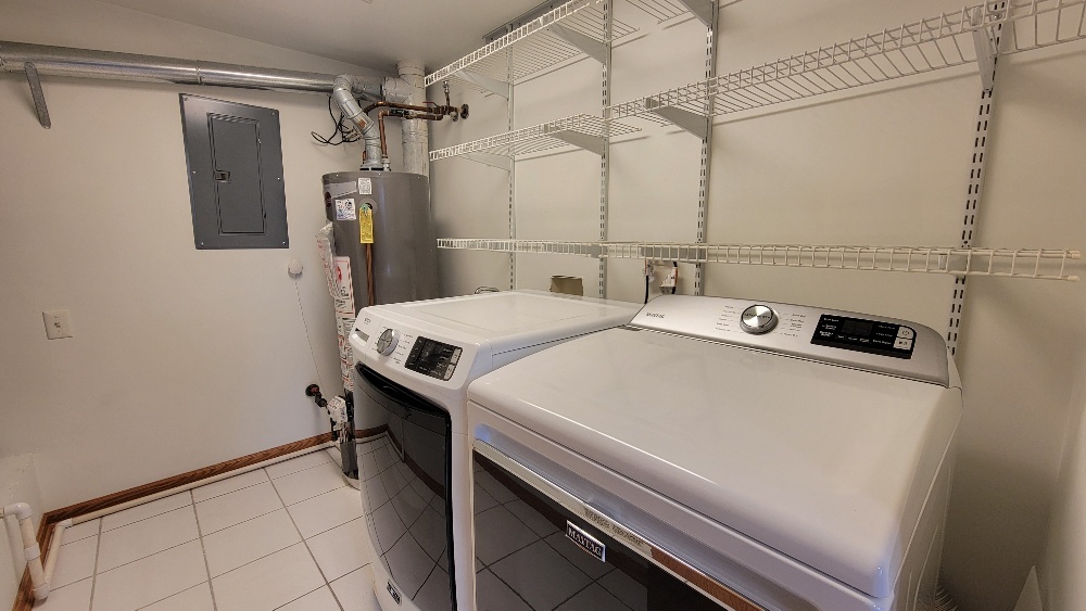 18100 Rita Road, Unit 2D Tinley Park, IL 60477 - Photo 25 of 28 a utility room with dryer and washer