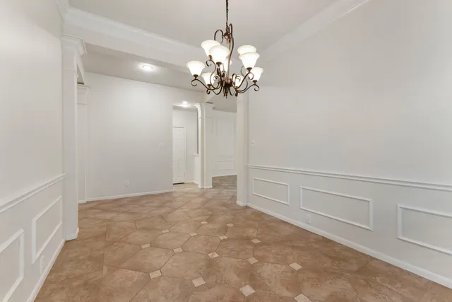 a view of a chandelier in big room