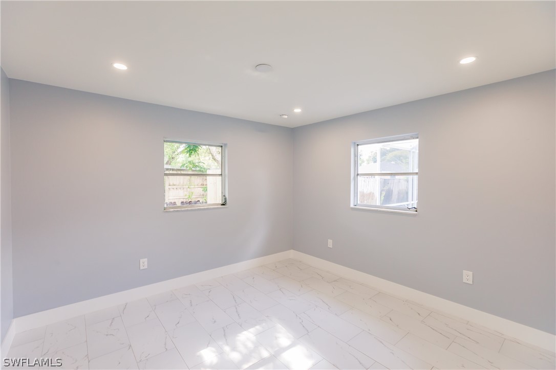 1623 Coronado Road Fort Myers, FL 33901 - Photo 13 of 24 a view of a livingroom with a window
