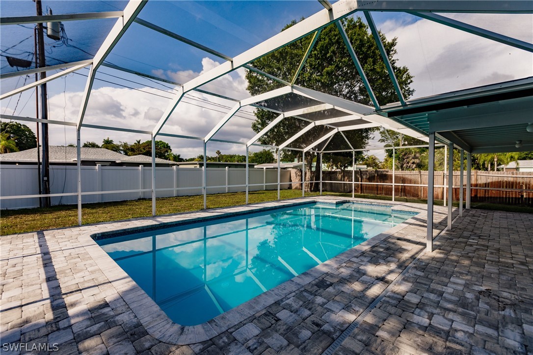 1623 Coronado Road Fort Myers, FL 33901 - Photo 20 of 24 a view of a backyard with swimming pool