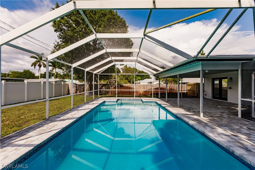 1623 Coronado Road Fort Myers, FL 33901 - Photo 21 of 24 a view of a backyard with a swimming pool