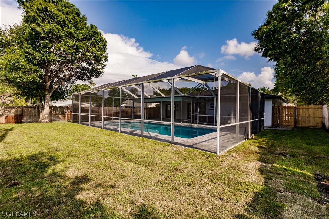 1623 Coronado Road Fort Myers, FL 33901 - Photo 22 of 24 a view of a house with a backyard