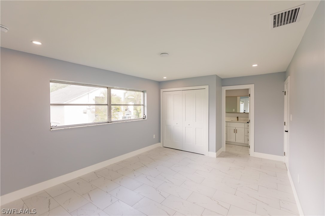 1623 Coronado Road Fort Myers, FL 33901 - Photo 10 of 24 a view of an empty room with a window