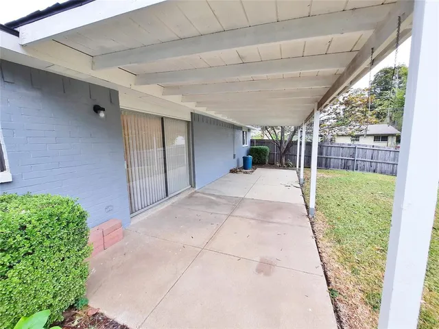 a view of a backyard of a house
