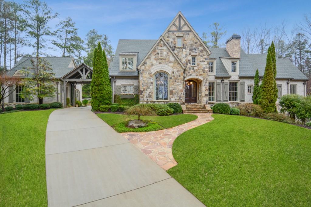 1660 Birmingham Road Milton, GA 30004 - Photo 1 of 1 The minute you pass through the gate the architectural perfection beckons you up the drive.