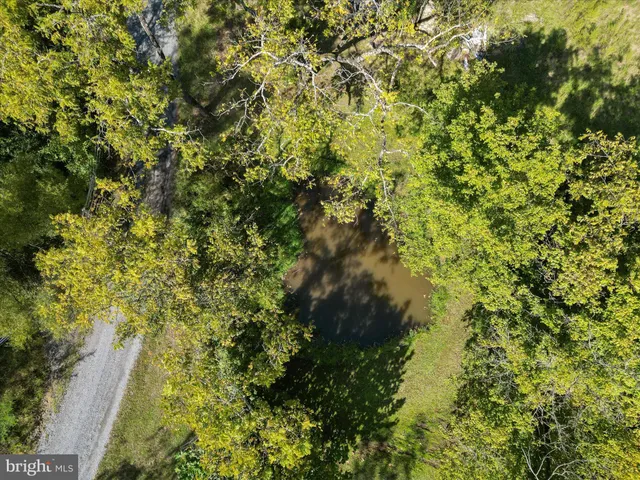 a view of a town with mountains in the background