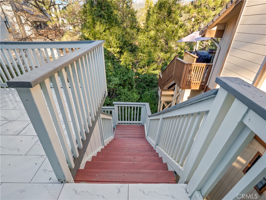 40557 Saddleback Road Bass Lake, CA 93604 - Photo 17 of 31 a view of balcony with wooden floor and fence