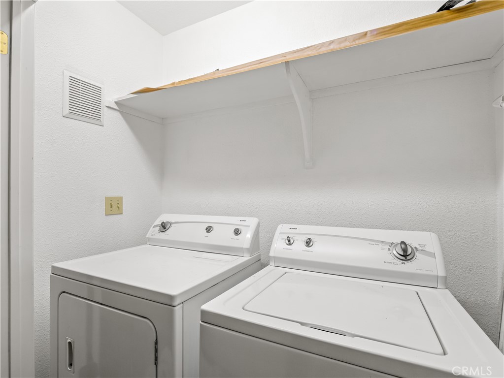 40557 Saddleback Road Bass Lake, CA 93604 - Photo 23 of 31 a utility room with dryer and washer