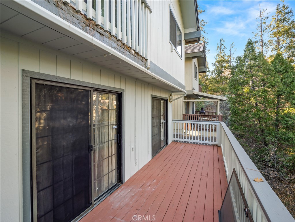 40557 Saddleback Road Bass Lake, CA 93604 - Photo 28 of 31 a view of balcony with wooden floor