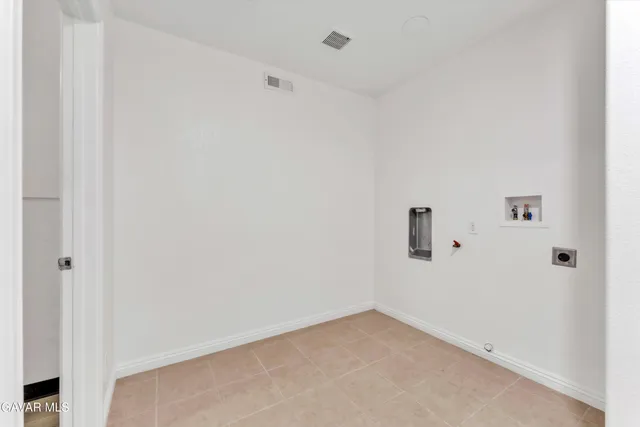 a view of a hallway with stairs