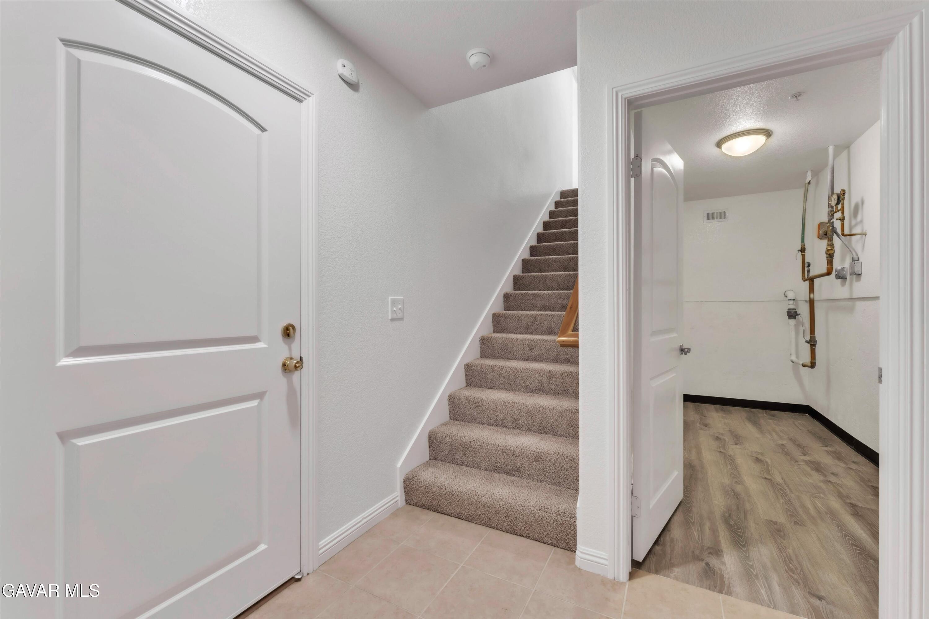 17819 Elizabeth Lake Road Lake Hughes, CA 93532 - Photo 25 of 28 a view of a hallway with stairs