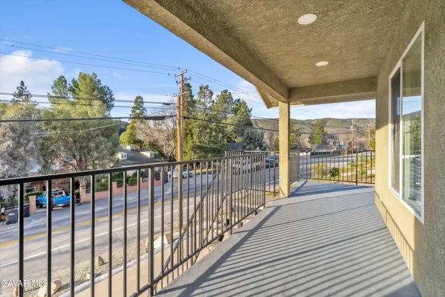 a view of house with outdoor seating